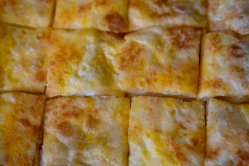 Close up of Thai roti pancake with egg.