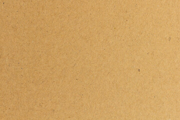 Paper  brown texture light rough textured spotted blank copy space background in yellow