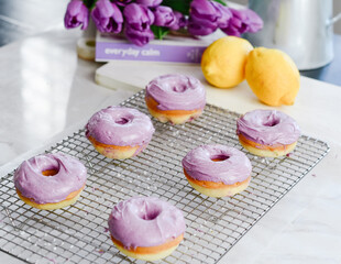 Obraz na płótnie Canvas Colorful dessert purple donuts Spring Easter