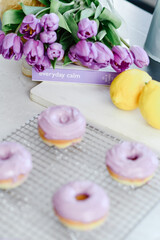 Fototapeta na wymiar Colorful dessert purple donuts Spring Easter