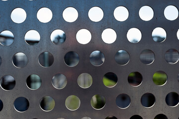 perforated steel surface