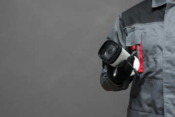 CCTV Installation specialist concept. Service for installing CCTV cameras. Security cameras in the...