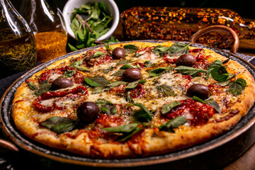 dry tomato pizza with basil and cheese