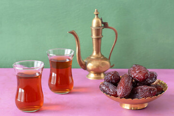 Tea and dates for Ramadan, Eida concept. Copy space.