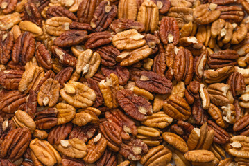 Tasty pecan-nut background. Top view.