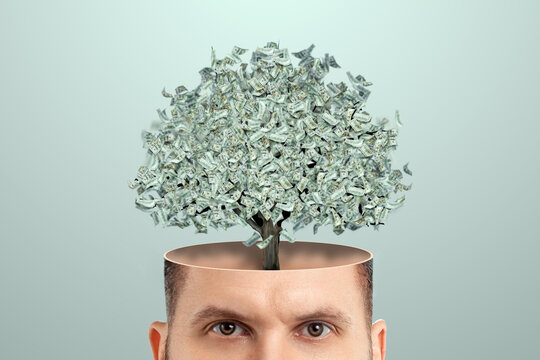 Business thinking, instead of a brain, a money tree sticks out of a man's head, dollars. Creative background, business concept, profitable idea, startup.