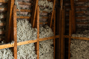 Loose-fill fiber and sheep wool insulation in walls, room renovation