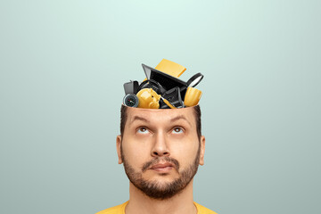Rubbish in the head, a man's head is open instead of a brain, various office rubbish. Creative...