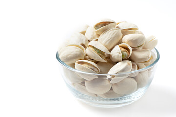 pistachios in.Glass cup isolated on white background.