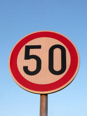 Speed limit traffic sign indicating 50km/h