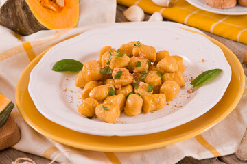 Pumpkin gnocchi with grated amaretti cookies. 