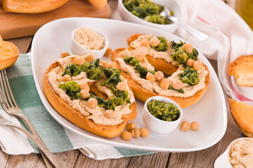 Friselle with turnip tops and hummus. 