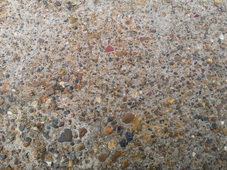 textured pebbles in asphalt and concrete. road paved website template