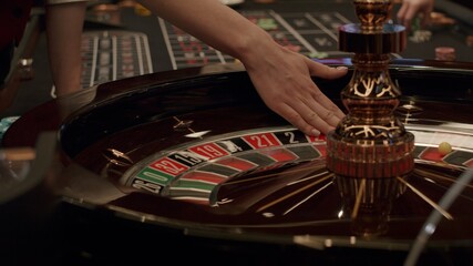 Roulette players place their bets