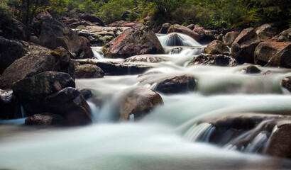 Long exposure image of a creek in the mountains. 