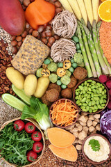 Immune boosting food for vegan diet with vegetables, legumes, tofu products, grains, nuts, noodles and snacks. High in protein, omega 3, antioxidants, anthocyanins, fibre, vitamins and minerals.