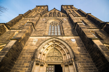 Prague, Czech republic - February 24, 2021. Direct wide view on Basilica Minor in Vysehrad fortress...