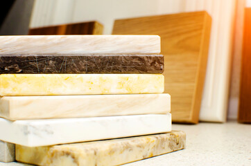 Sample of artificial acrylic stone for kitchen countertops and other furniture. Stone texture for modern interior design