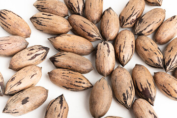 Pecan Nuts In Shell On White Background