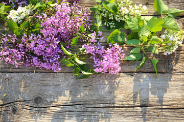 Lilac on an old wooden background