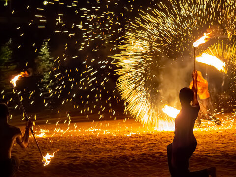 fire artists at the beach