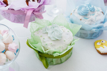 Beautiful Easter cakes on a decorated light table. A light holiday of Easter.