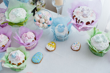 Beautiful Easter cakes on a decorated light table. A light holiday of Easter.