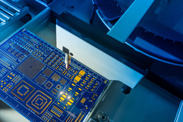 PCB manufacturing process. PCB soldering machine. Equipment for laser soldering of printed circuit...