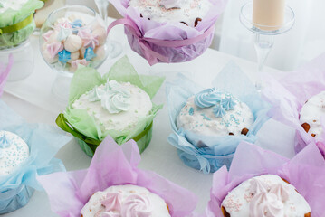 Beautiful Easter cakes on a decorated light table. A light holiday of Easter.