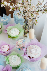 Beautiful Easter cakes on a decorated light table. A light holiday of Easter.