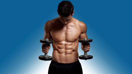 Strong handsome young man with bare torso, training with dumb-bell, showing six pack abs, isolated...