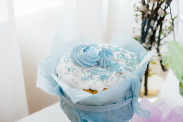 Beautiful Easter cakes on a decorated light table. A light holiday of Easter.