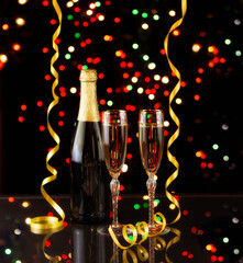Happy New Year celebration with champagne and glowing lights