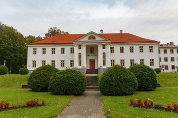 Fototapeta na wymiar Volveti manor, white classical building. Estonia