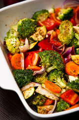 Fried chicken stripes with vegetables dish
