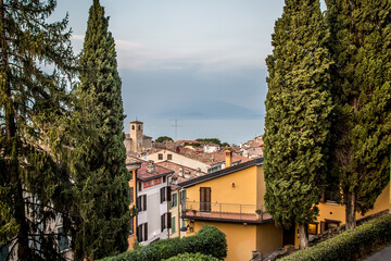 Beautiful view of Desenzano and Lake Garda on an autumn evening. Desenzano, Verona, Italy