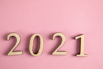 wooden 2021 text on pink background