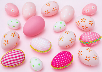 Fototapeta na wymiar Happy Easter. Pink pastel color eggs variety on pink background