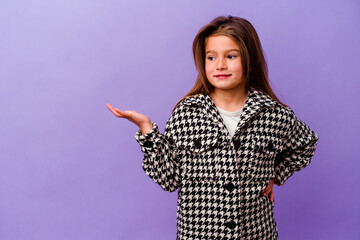 Little caucasian girl isolated on purple background Little caucasian girl isolated on purple...