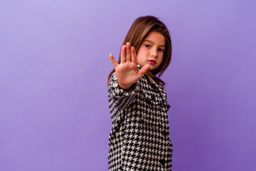 Little caucasian girl isolated on purple background Little caucasian girl isolated on purple...
