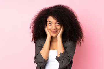 Young african american woman over isolated background frustrated and covering ears