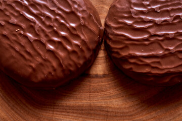 Chocolate drenched cookies. Macro effect photo.