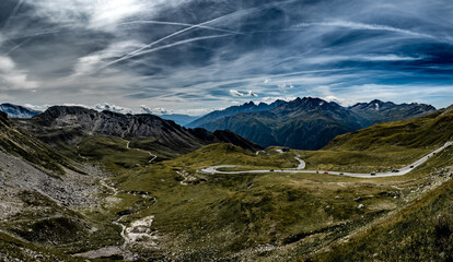 Obraz premium Mountain pass and high alpine road in national park Hohe Tauern with mountain peak Grossglockner
