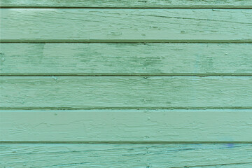 Obraz premium Green wooden background made of old boards for copying space. Mint color