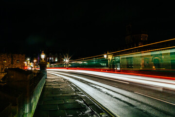 Fototapeta na wymiar Traffic Light Trails Over Lendal Bridge, York, England