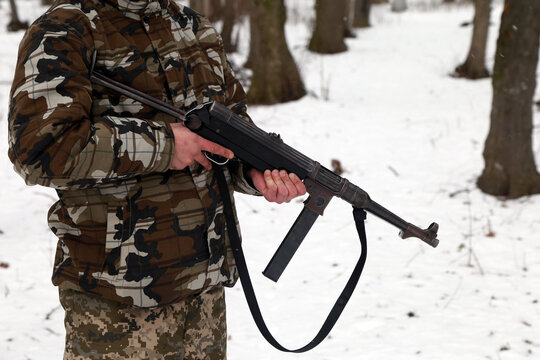 German machine gun of world war two in hands of a soldier
