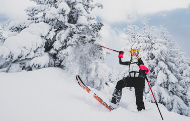 Mountaineer backcountry ski walking ski alpinist in the mountains. Ski touring in alpine landscape...