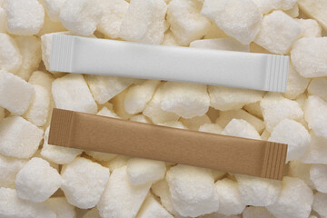 Blank sachet stick packs on sugar cubes. 3D rendering and photo.