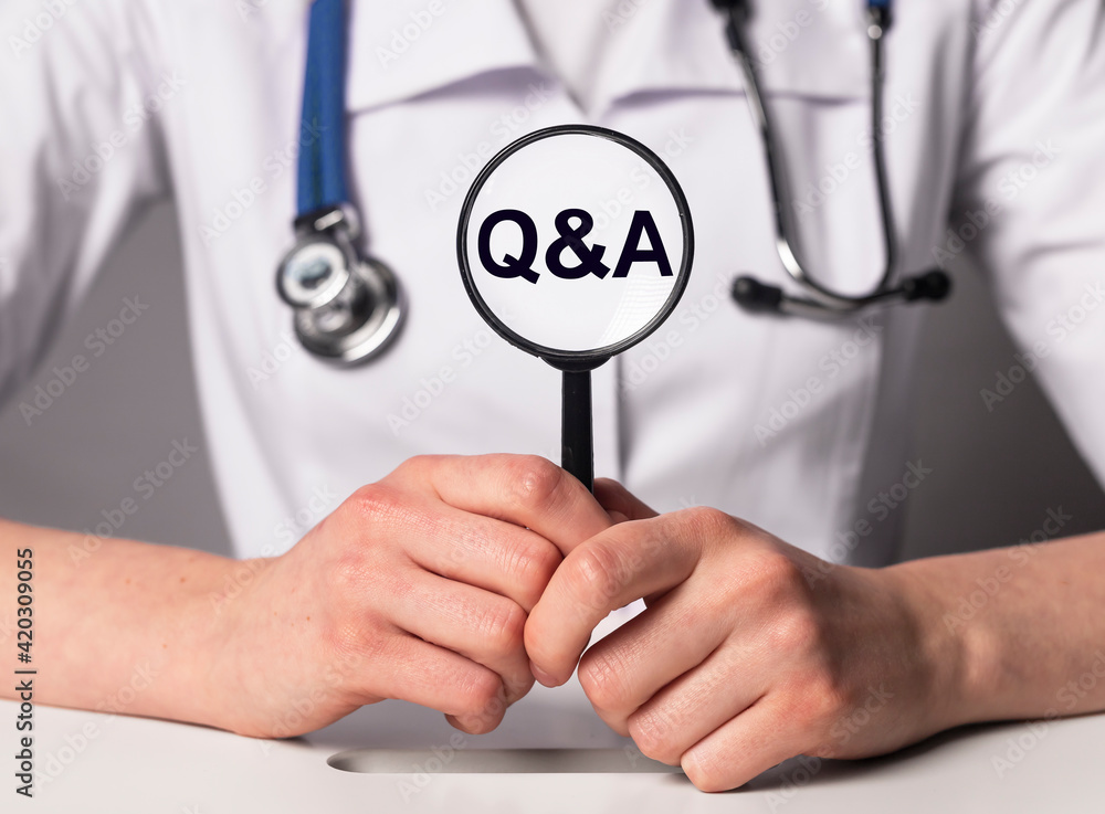 Poster questions and answers, q or qa concept, inscription in doctor hands