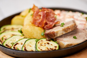 meat with vegetables and sauce